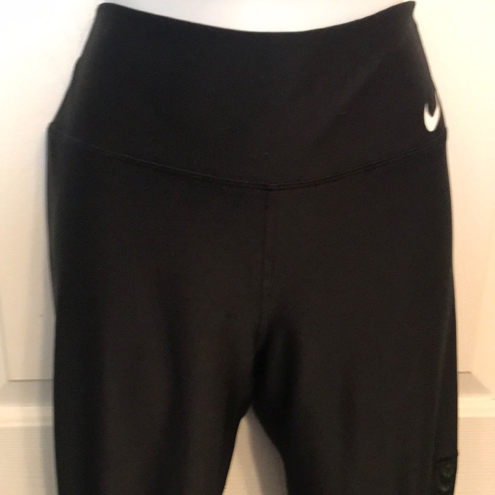 Nike women’s leggings with mesh knee. Black and gray, Dri-fit, Medium.